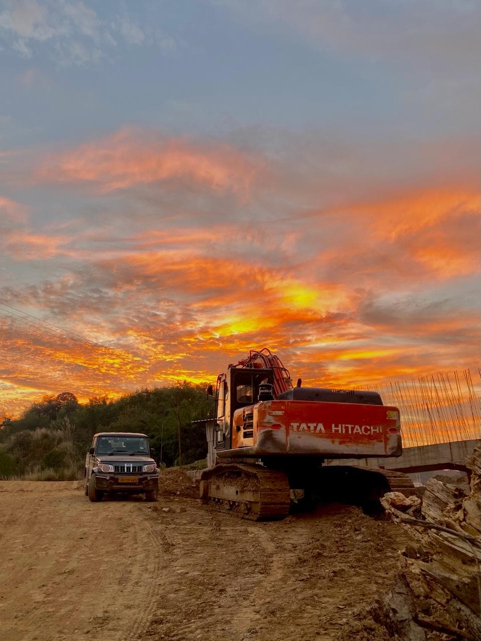 Excavator sunset — WanX Infra project