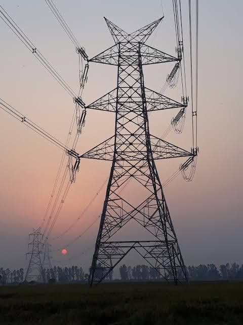 Power transmission tower sunset — WanX Infra project